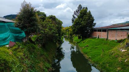 Perspective of the Subachoque River from a bridge in Madrid – Cundinamarca - Colombia
