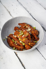 spicy steamed chicken feet that is very popular across Asia