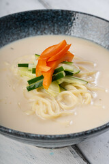 Korean cold soybean noodle soup also known as kongguksu 