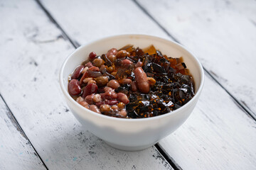 grass jelly with mung beans and kidney beans on a bowl
