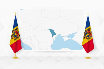 Map of Moldova and flags of Moldova on flag stand. - 782034107