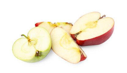 Pieces of ripe apples isolated on white
