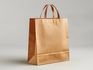 A blank brown paper bag isolated on light grey background