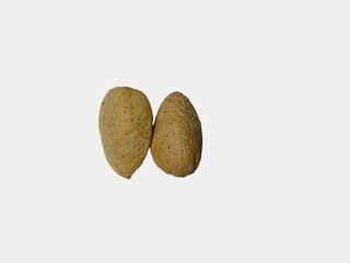 Fototapeta na wymiar Two Whole Almonds with Shells Arranged Neatly on a Clean White Background: Ideal for Nutritional Blogs, Health-conscious Websites, and Culinary Projects
