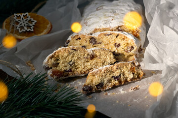 Traditional European Christmas pastry bread, fragrant home baked stollen, with spices and dried...