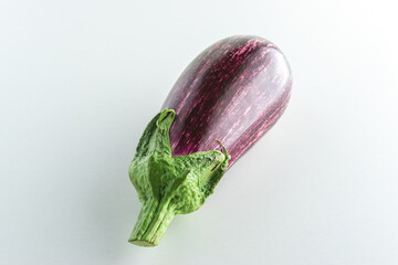 Ripe graffiti eggplant isolated on a white background. Food concept.