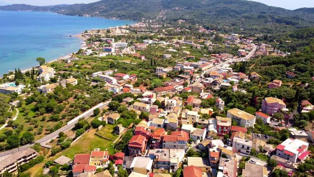 coast of corfu island greece, view of the hill and houses