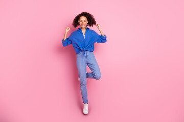 Photo of cheerful adorable nice girl wear trendy blue clothes celebrate success yes hooray isolated...
