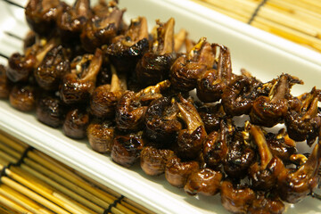 Japanese snails at a Kyoto market stall in Japan.
