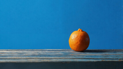 orange on a blue background, citrus, juicy fruit, fresh, vitamin C, immunity, healthy food, vegetarianism