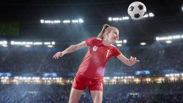 Aesthetic Super Slow Motion Shot Of Female Soccer Football Player Doing A Head Kick on Stadium WIth Crowd Cheering. Winning Goal on International Championship Final Match on Arena Full Of Loyal Fans.