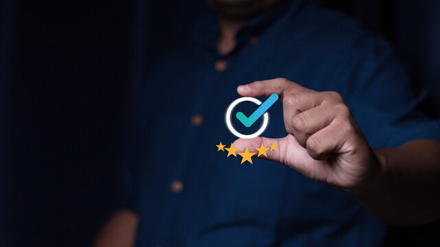 Quality Assurance Concept. Business people show high quality assurance mark, good service, premium, five stars, premium service assurance, excellence service, high quality, business.