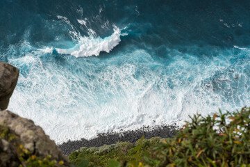 Aerial view of waves crashing on the rocks in the Atlantic Ocean coast
