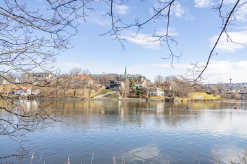Walking along Nidelven (River) in a Spring mood in Trondheim city - 782108387