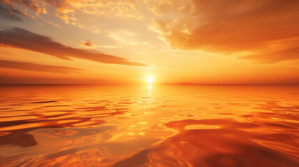 Colorful sunset on the beach with orange sky and reflection of glare on the surface of sea water