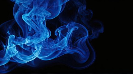Fototapeta premium Beautiful blue smoke on a black background.