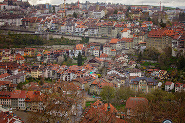 Panoramic view of Fribourg, a charming city blending old-world architecture and modern living,...