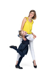 A happy smiling young mother with a laughing little daughter in school clothes, isolated on a white background