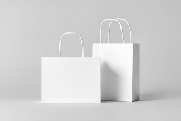 White Paper Twist Carrier Bags, shopping paper bag, plain, on a white background, mock up