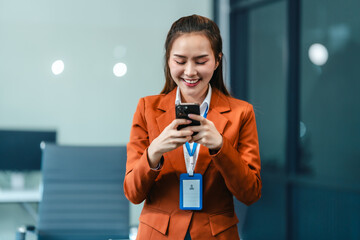 In Asian legal compliance, legal counseling office, a female lawyer reads a contract, advising on...