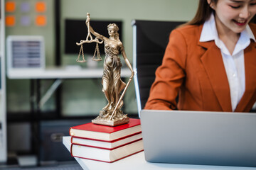 In Asian legal compliance, faculty of law, legal counseling office, a female lawyer reads a...