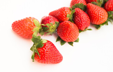 Fresh appetizing strawberries on a white background