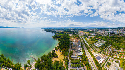 Lausanne, Switzerland. Lake embankment and city panorama in summer. Aerial view