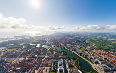 Copenhagen, Denmark. Panorama of the city in summer. Sunny weather with clouds. Aerial view