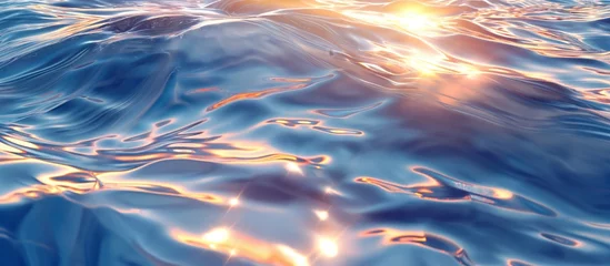 Foto op Canvas A serene picture of the water surface reflecting the golden sunlight with light ripples and waves, background © Vadim