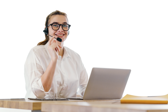 A young female consultant operator uses a microphone and internet in the office laptop. Isolated background.