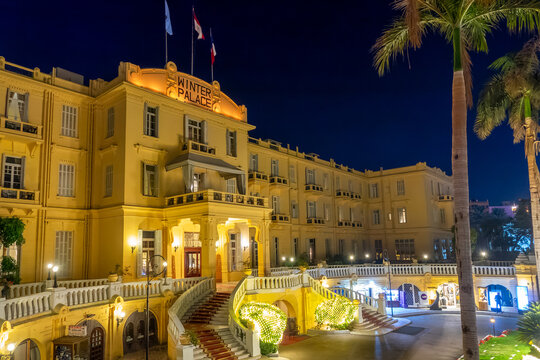 Famous old Winter Palace hotel at night, on the banks of the Nile river in Luxor, Egypt
