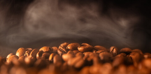 Closeup coffee beans on warm light 