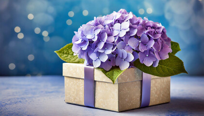 Mother's Day card with gift box and hydrangea flower on blue background, copy space