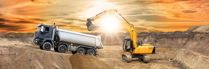  excavator is working and digging at construction site - 782179152