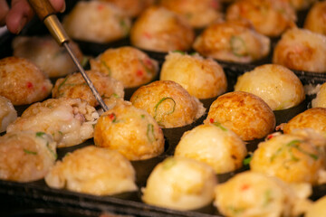 Authentic Takoyaki balls from Osaka. Takoyaki is a Japanese food made from wheat flour and octopus.