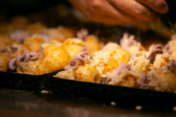 Authentic Takoyaki balls from Osaka. Takoyaki is a Japanese food made from wheat flour and octopus.