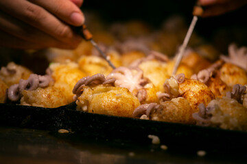 Authentic Takoyaki balls from Osaka. Takoyaki is a Japanese food made from wheat flour and octopus.