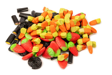 Assorted colorful gummy candies isolated on a white background. Top view.