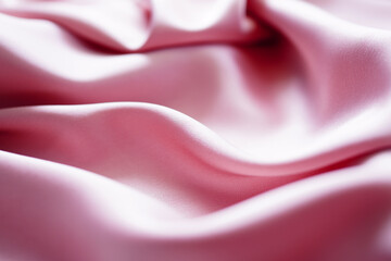 Obraz premium Textured Satin Duchess pink plush draping fabric. Elegant and elegant background. Space for web banner design templates. Close-up, blurred or blurred images.