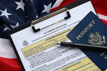 Department of State form DS11 Application for a U.S. Passport lies on table and ready to fill close...