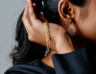 Woman's ear wearing a beautiful earrings