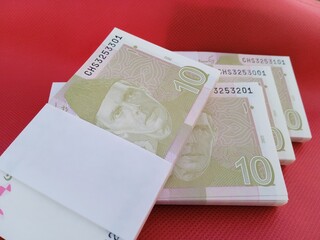 Bundle of Pakistani Currency. 10 Rupees note Pakistani, Pakistani currency note PKR 10 rupees. Heap of Pakistani currency bundle