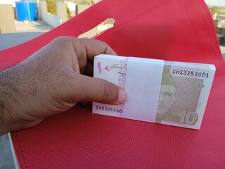 Bundle of Pakistani Currency. 10 Rupees note Pakistani, Pakistani currency note PKR 10 rupees. Heap of Pakistani currency bundle