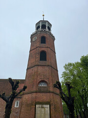 Fototapeta na wymiar Church tower in Ditzum
