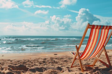 A beach chair sitting on top of a sandy beach. Suitable for vacation or travel concepts
