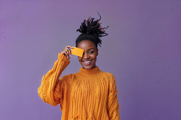 Happy woman paying with a card 