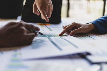 Business meeting, Company executives meeting discussing strategic analysis and business planning.