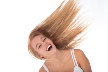 Young woman's dynamic hair frames vibrant laughter