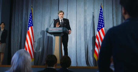 Presidential of USA candidate makes an announcement, delivers campaign speech, answers questions, gives interview to media. American republican politician performs at press conference. Election day. - obrazy, fototapety, plakaty