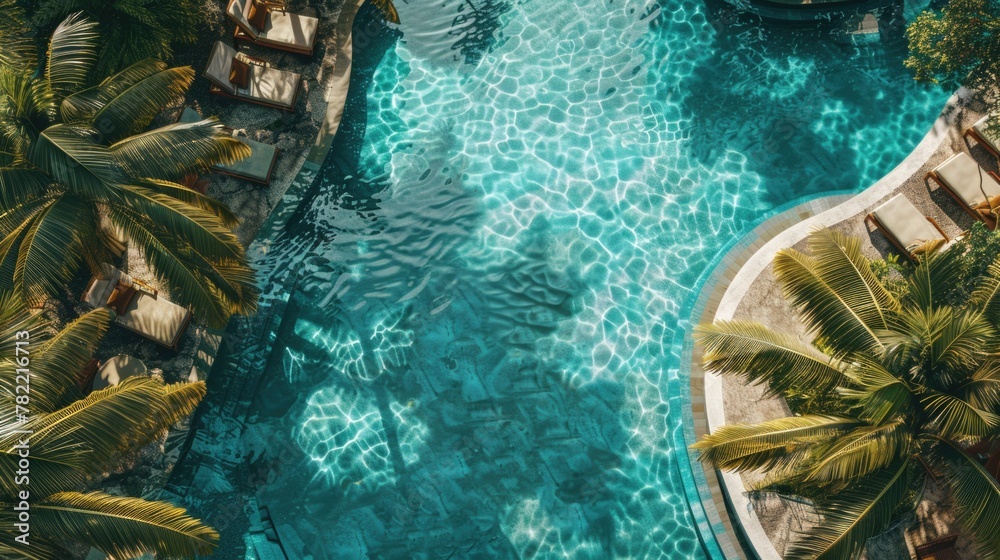 Poster aerial view of a pool surrounded by palm trees. great for travel and vacation concepts